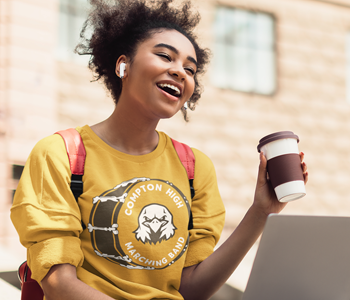 girl wearing marching band crewneck