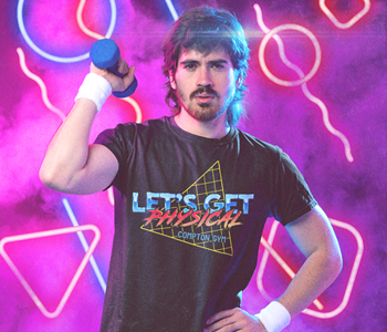 man wearing dark grey t shirt with 'lets get physcial compton gym' design